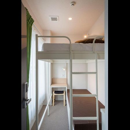 Hotel Plus Hostel Sapporo Bagian luar foto