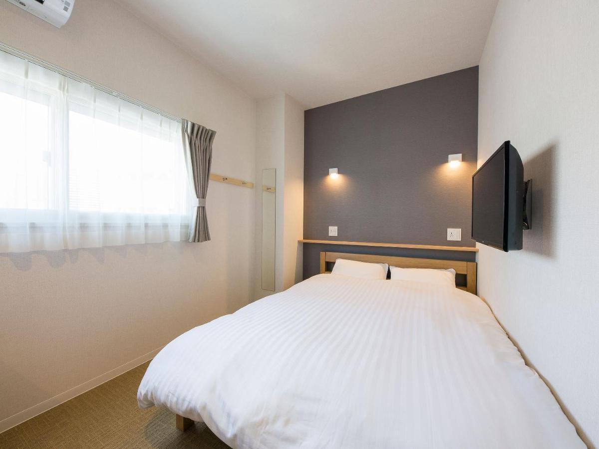 Hotel Plus Hostel Sapporo Bagian luar foto