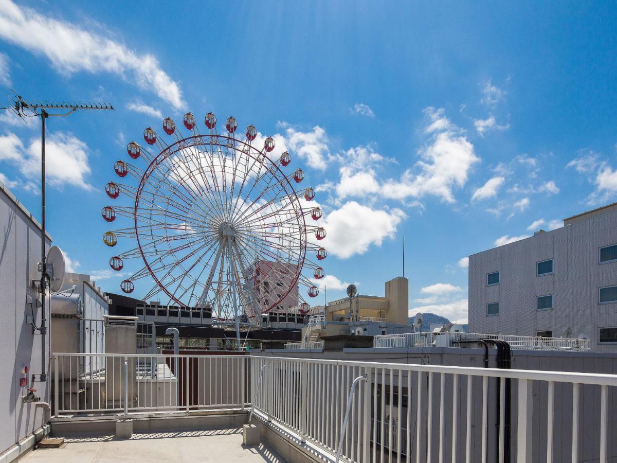 Hotel Plus Hostel Sapporo Bagian luar foto