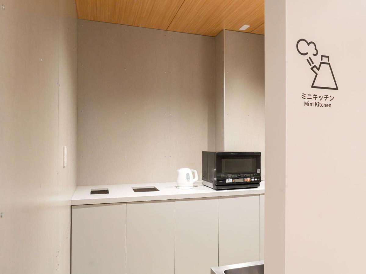 Hotel Plus Hostel Sapporo Bagian luar foto