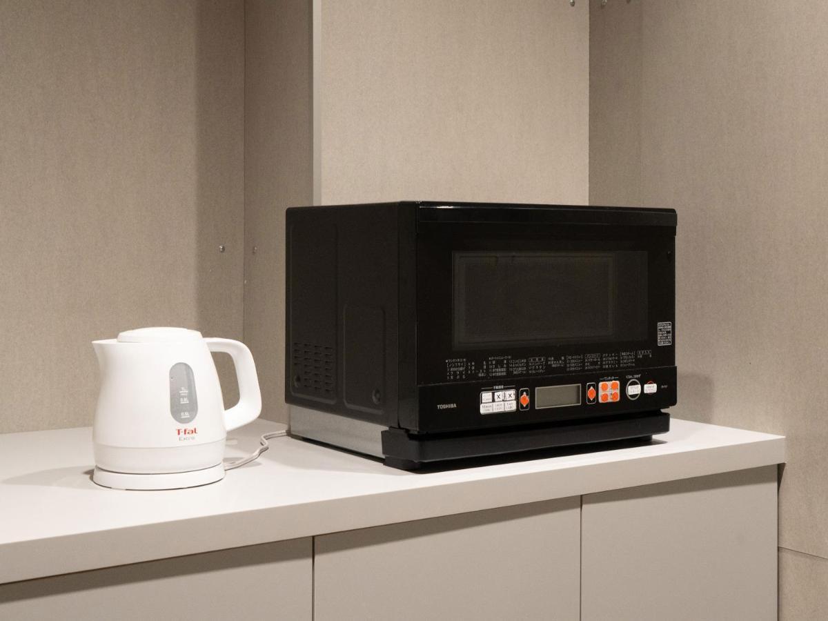 Hotel Plus Hostel Sapporo Bagian luar foto